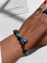 Load image into Gallery viewer, Tigers eye X Nazar Speak Your Truth Charm Bracelet

