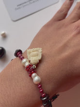 Load and play video in Gallery viewer, Feeling Safe, Buddha Charm, Garnet X Pearl Bracelet
